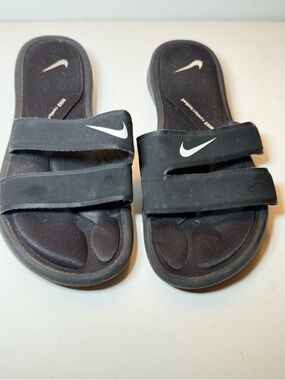 Nike Black Slide Sandals with White Swoosh Accents
